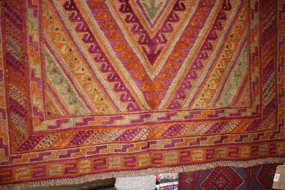 An approx. 4'2" x 3'11" Gazak rug