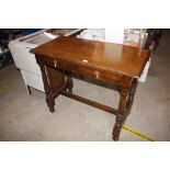 An oak stretcher table fitted two drawers