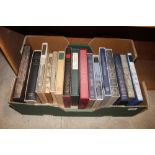 A box of Folio Society books