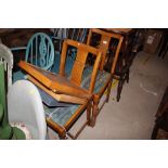 A pair of 1930's oak dining chairs