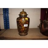 A cloisonné vase and cover on hardwood stand