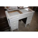 A white painted display table