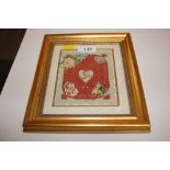 A Victorian scrapwork picture contained in gilt fr