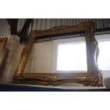 An antique gilt picture frame