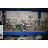 A collection of various decorative glassware to in