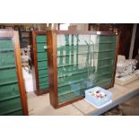 Two collectors display cabinets