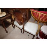 A pair of mahogany bedroom chairs; and two trays