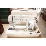 A Newhome electric sewing machine sold as collecto