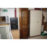 A walnut effect corner cabinet fitted single drawe