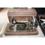 A Frister and Rossmann hand sewing machine