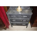 A painted chest fitted three drawers