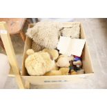 A box of various Teddy bears