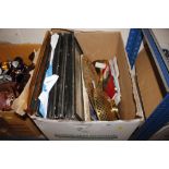 A box of pictures and brassware