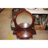 A Victorian mahogany swing framed mirror