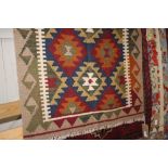 An approx. 4'1" x 2'9" Meimana Kelim rug