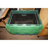 A quantity of plastic storage crates