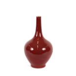 A Chinese sang de boeuf onion shaped vase, 38cm high