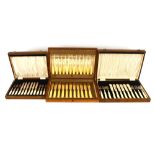 A cased set of twelve each silver bladed fish knives and forks, Sheffield 1930, one knife missing; a