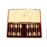 A set of twelve silver teaspoons and sugar tongs, by The Goldsmiths & Silversmiths Co. London 1912