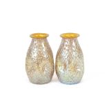 A pair of yellow tinted Loetz Art Glass vases, having dimpled effect, 20cm high