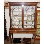 A 19th Century mahogany china display cabinet, in the Chippendale manner, the upper adjustable