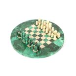 A Malachite chess board, and hard stone chess men