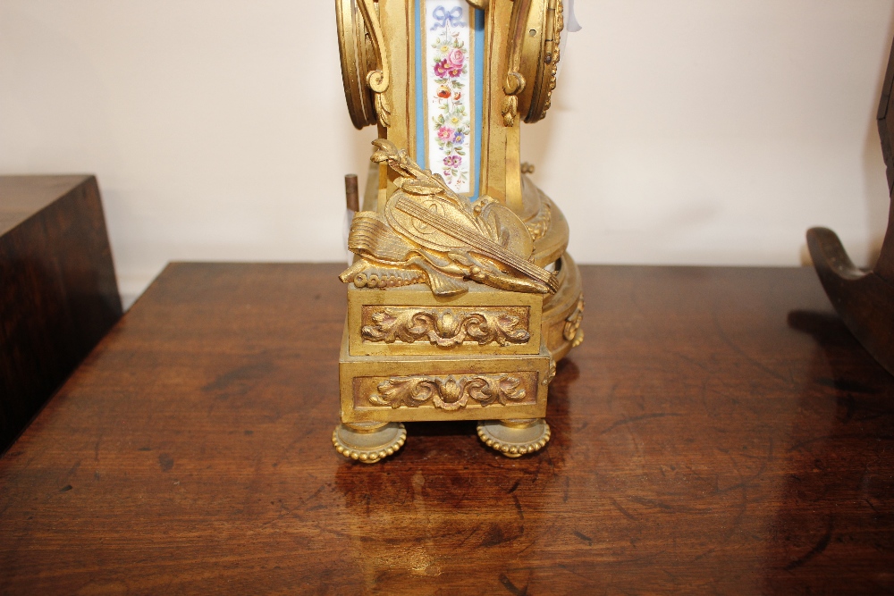 A 19th Century French gilt metal mantel clock, decorated with Sevres style porcelain panels, - Image 6 of 13