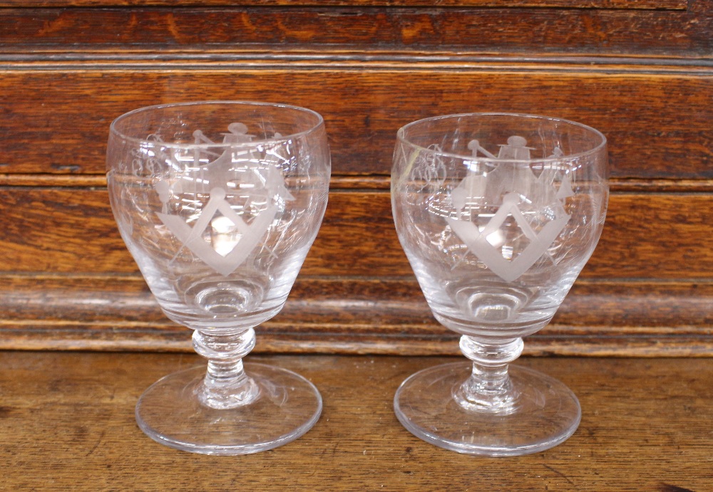 An etched glass Masonic rummer, decorated with symbols and monogrammed "CC", raised on a circular