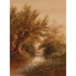 Henry Sylvester Stannard 1870-1951, tranquil river landscape with deer on a grassy bank, signed