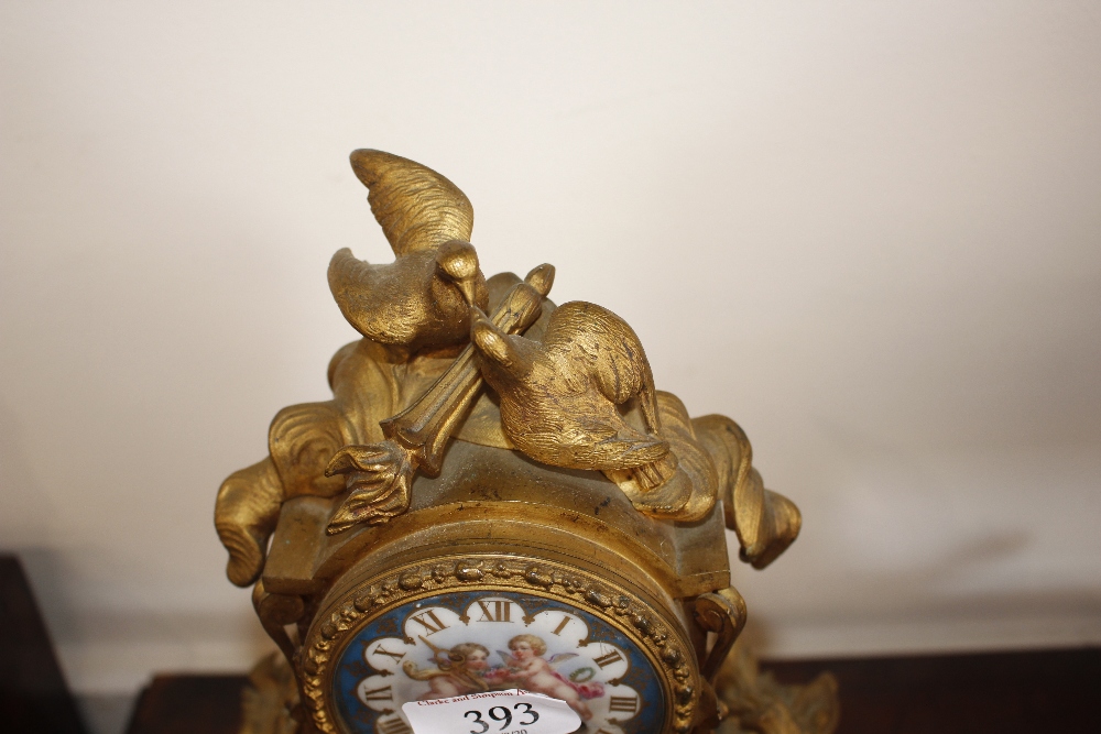 A 19th Century French gilt metal mantel clock, decorated with Sevres style porcelain panels, - Image 11 of 13