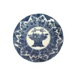 A Chinese blue and white plate, with central decoration of a basket of flowers with foliate and