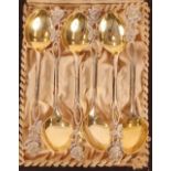A cased set of Swedish silver rose decorated spoons