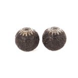 A pair of 19th Century Eastern carved spherical Areca Palm nuts, in the 18th Century style, finely
