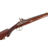 An Antique flintlock rifle, of Indian manufacture, having brass mounts with integral ram rod,