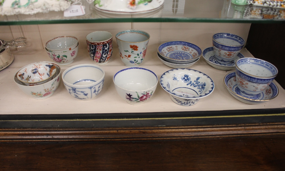 A small collection of 18th Century Worcester, famille rose and other tea bowls, modern Chinese tea