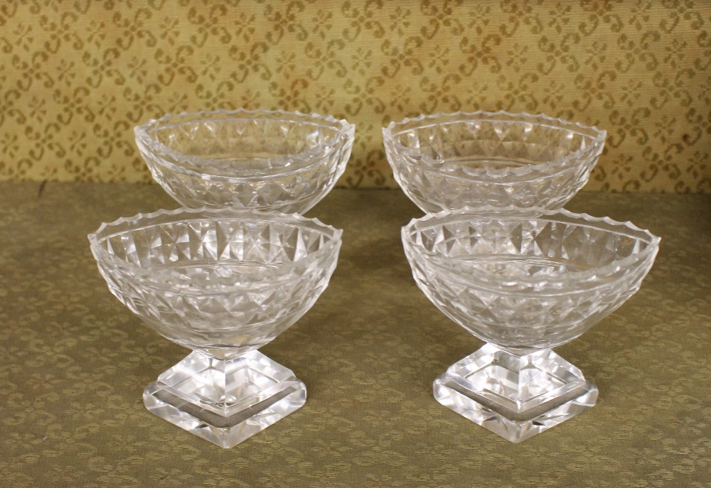 A set of four Antique cut glass pedestal salts, of boat shape, raised on faceted bases with