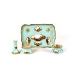 A Meissen desk set, decorated with various scenes on a turquoise ground heightened in gilt,