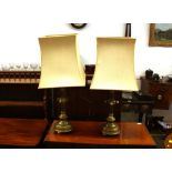 A pair of Antique brass ecclesiastical  candlesticks, of circular fluted form, decorated with