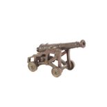 An Antique bronze model of a field cannon, makers mark to base