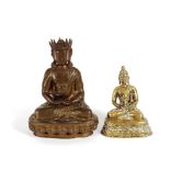 An Oriental bronze figure of a seated Buddha, 28cm; and a smaller example, 17cm, (2)