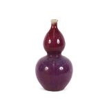 A Chinese sang de boeuf double gourd shaped vase, 37cm high