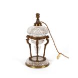 A decorative hob-nail cut glass and gilt mounted table lamp, (converted to electricity), the font