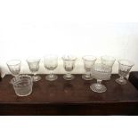 Seven various Victorian rummers; a double lipped glass rinser and a Greek key decorated pedestal
