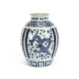 A large Oriental blue and white ovoid vase, decorated with dragons and foliage, 46cm high