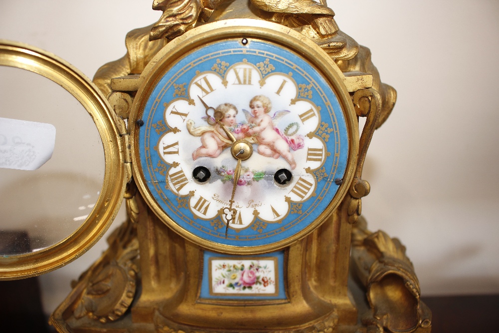 A 19th Century French gilt metal mantel clock, decorated with Sevres style porcelain panels, - Image 2 of 13