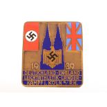 An interesting enamel bronze plaque, in red and blue dated 1939 for the Germany vs England Athletics