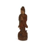 A carved wooden figure of Guanyin, 58cm high