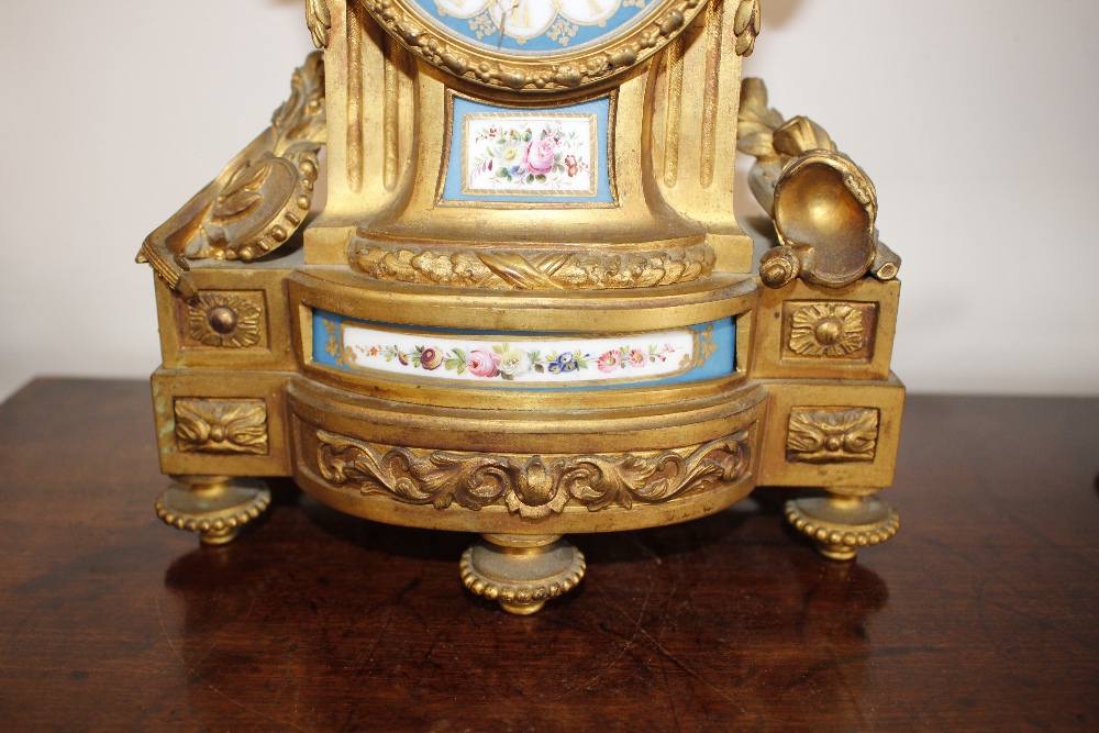 A 19th Century French gilt metal mantel clock, decorated with Sevres style porcelain panels, - Image 8 of 13