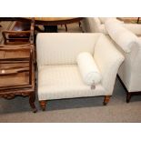 A good quality mahogany framed corner seat, in the Regency style, upholstered in floral stamped