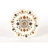 A small Peitra-Dura platter, decorated trailing foliage, 20.5cm dia.